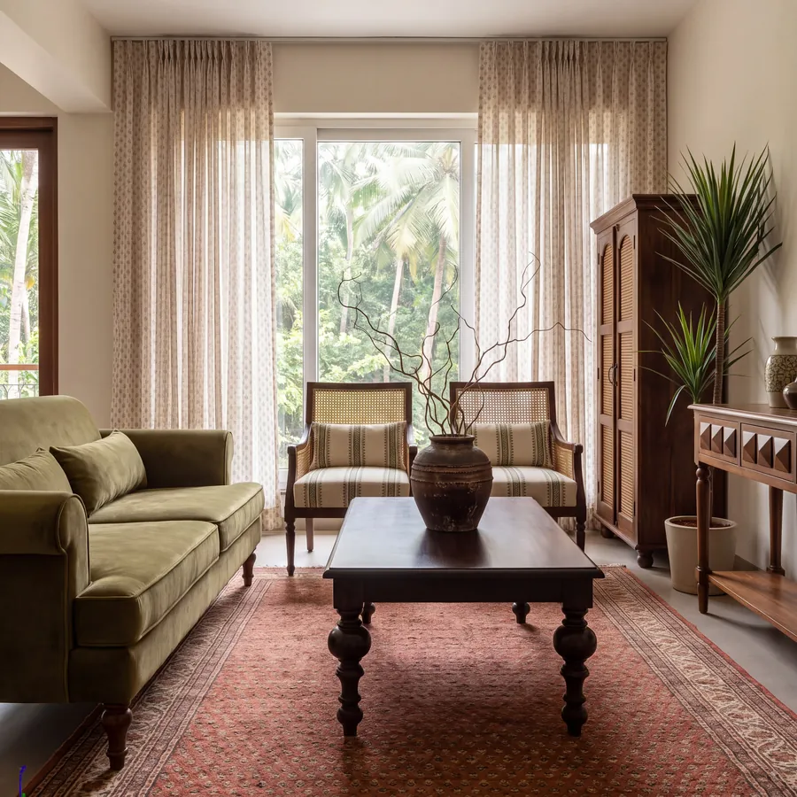 Interiors: living room with heritage furniture and garden view