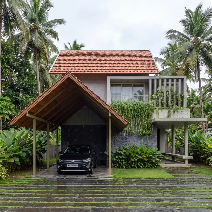 Tiled Canopy House by Claycode Architects: gabled timber carport canopy before a concrete house with tiled roof