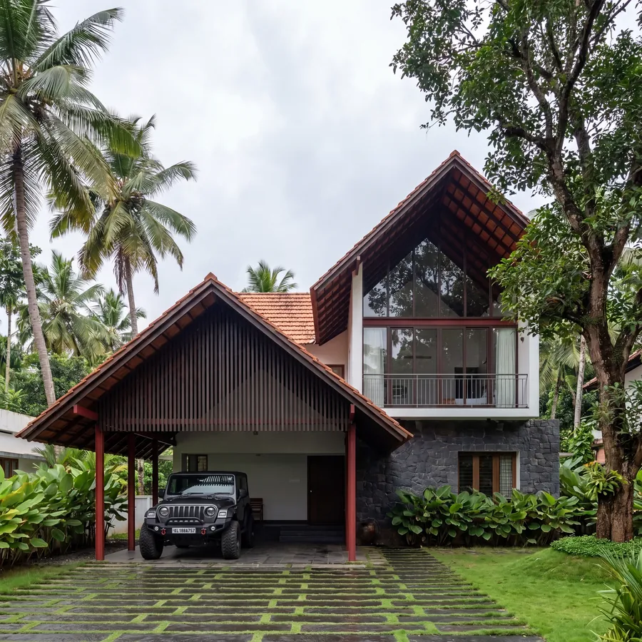 Red Column House by Claycode Architects: tiled gable carport on red columns with timber screen and glazed upper gable