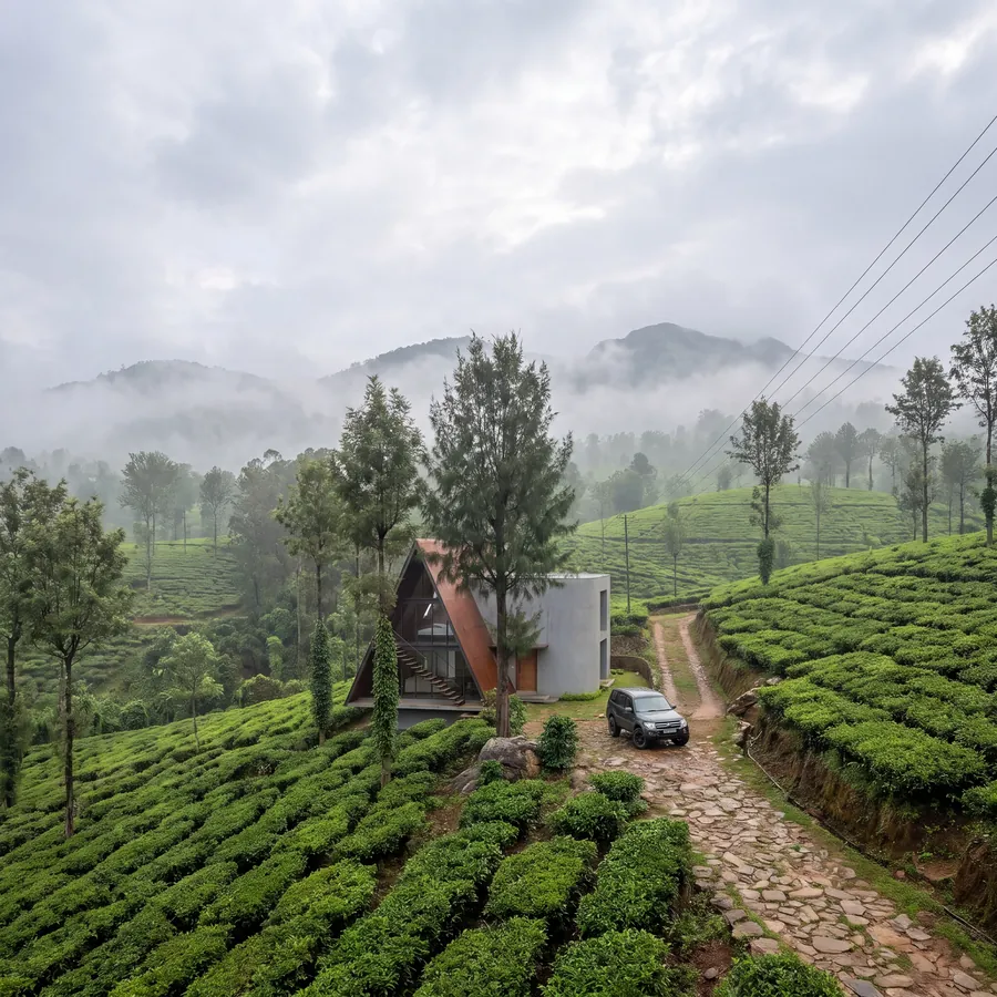 Tea Hills House by Claycode Architects: A-frame house among tea bushes and misty hills